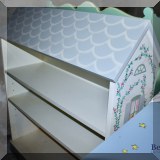 F57. Painted dollhouse bookshelf from Perrywinkle. 